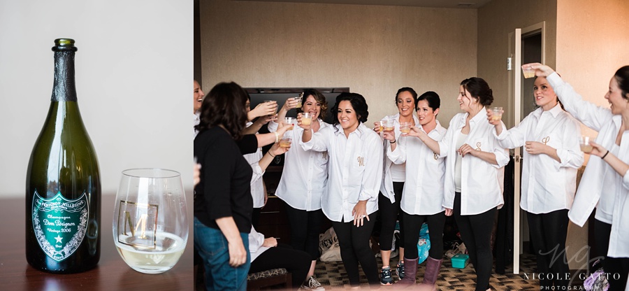 bridesmaids drinking champagne at the embassy suites