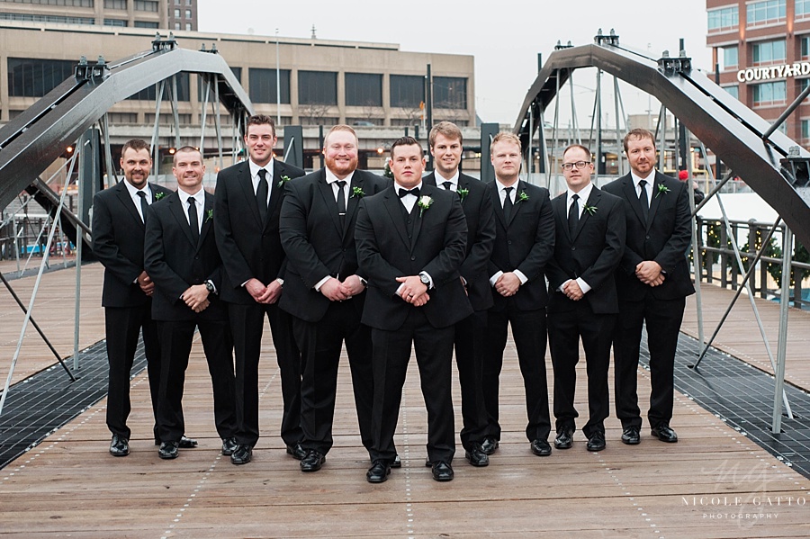 Pearl street wedding photo of grooms men 