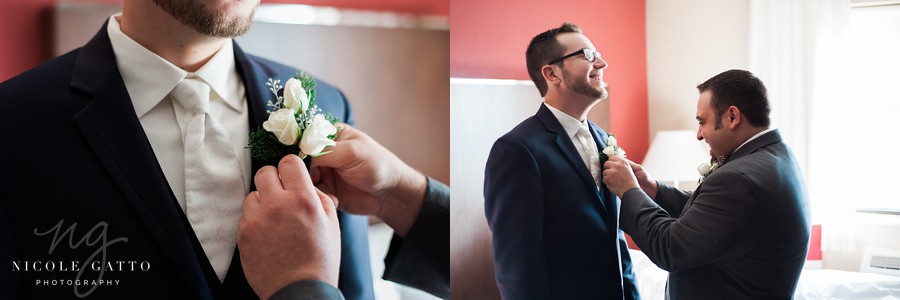 Groom getting dressed at sheraton at the falls