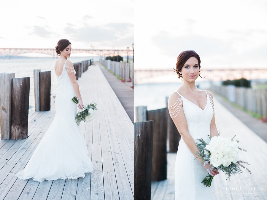 Bride by herself with flowers infant of niagara river