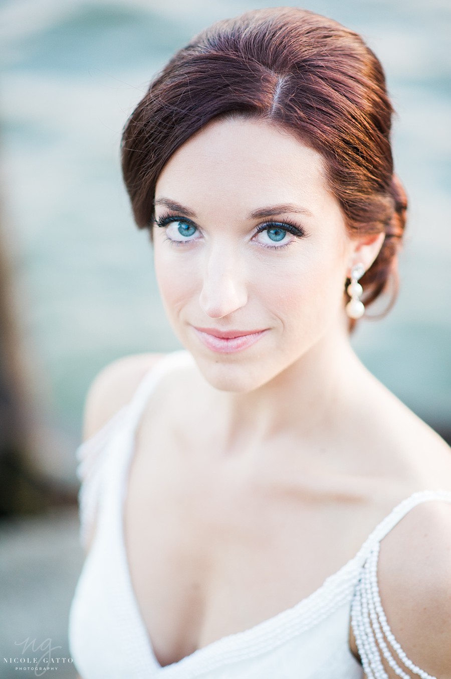 brides face with water in background