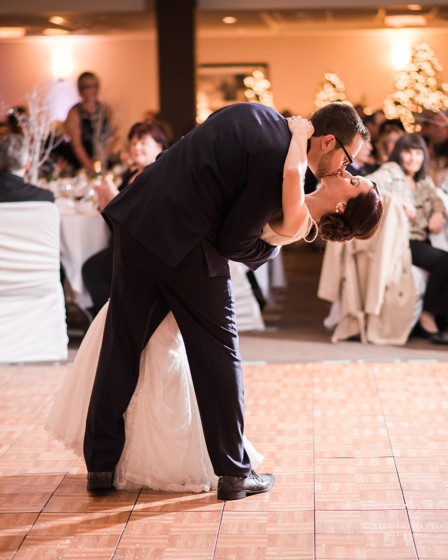 Groom dipping bride in buffalo wedding photography