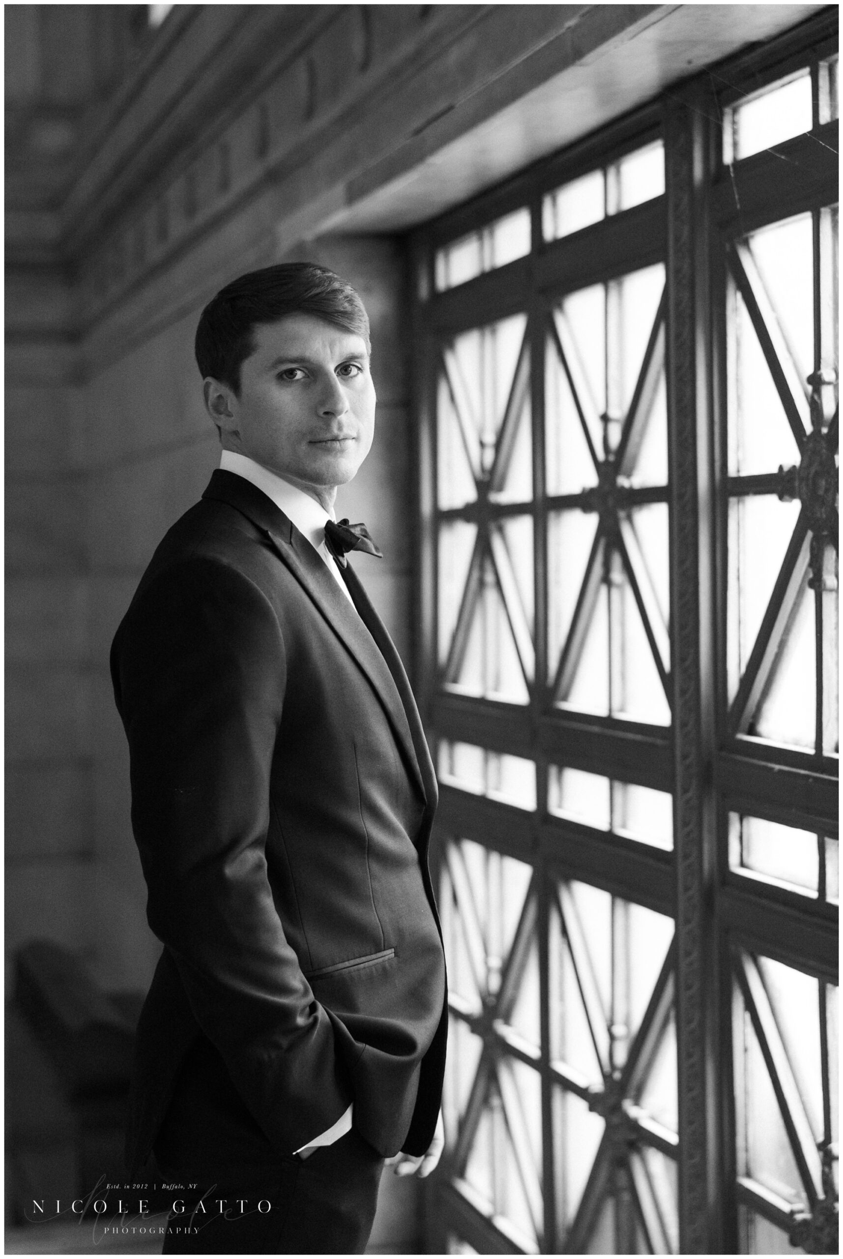 portrait of groom from wedding at ellicott square building buffalo ny
