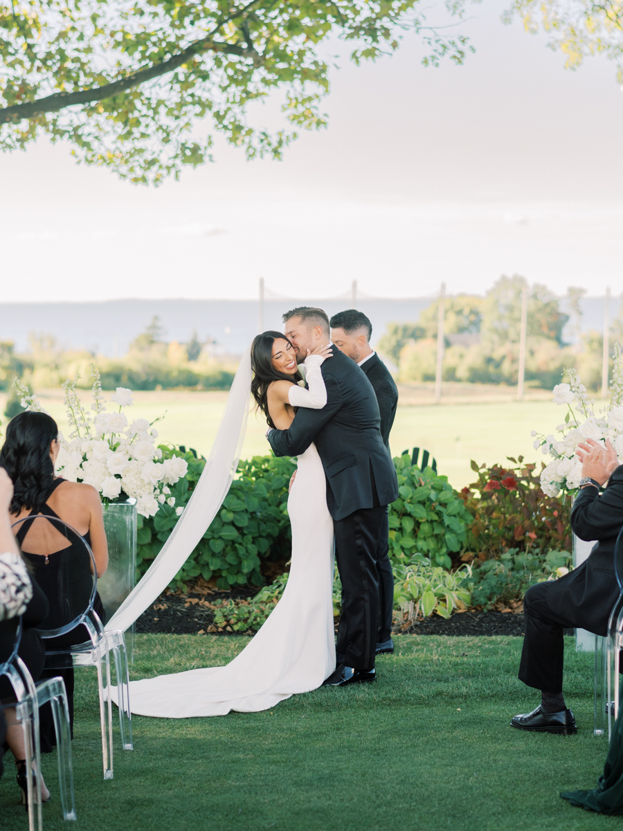 bride and groom kissing shot on film