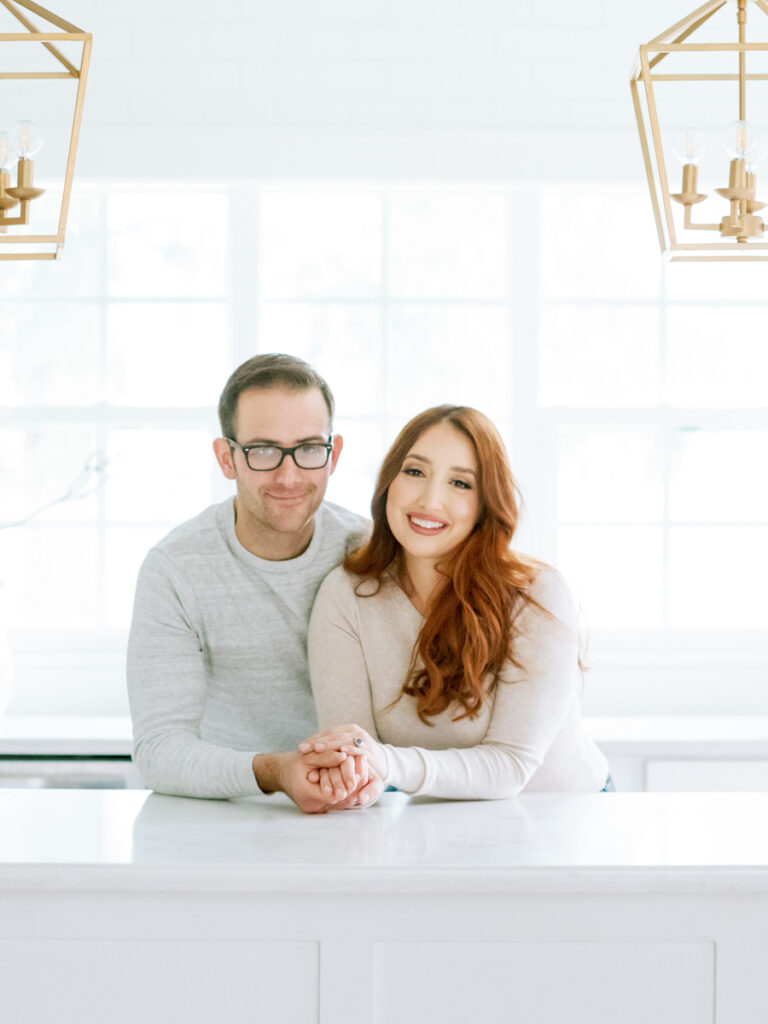 buffalo wedding film photographers Nicole and Marc Gatto in their kitchen